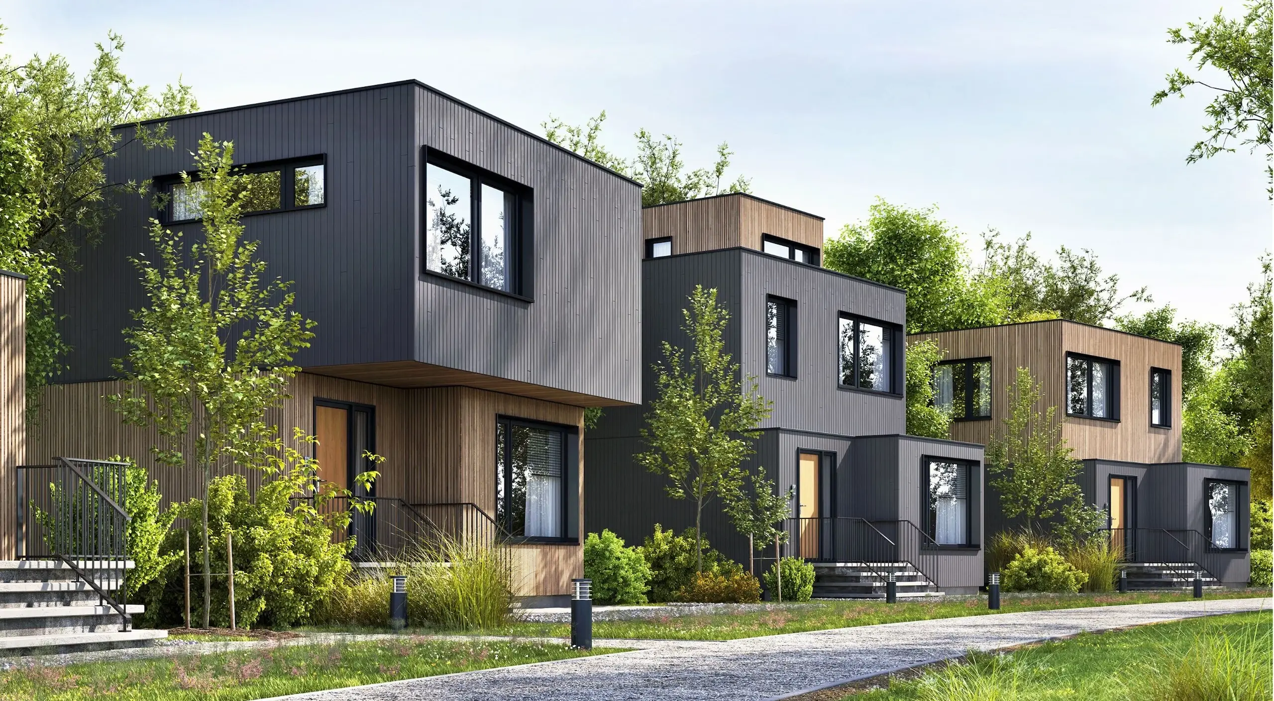 Nowoczesne domy o czystych liniach, elewacjach z drewna i aluminium – idealne dla ogrodów zimowych, pergoli i żaluzji aluminiowych